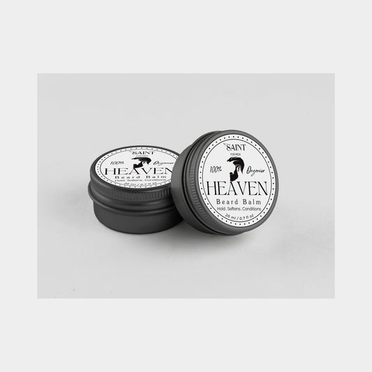 Saint for Men Heaven Beard Balm — two 50ml tins (one open, one closed) on a light gray background