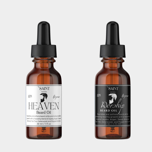 Saint for Men Heaven & Worship Beard Oil — two amber dropper bottles on a light gray background